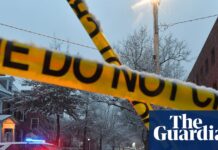 Person of interest detained in Brown University shooting that left two dead