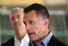 Australia news live: disaster assistance announced for NSW bushfire victims after up to 16 homes destroyed