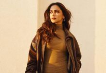 Deepika Padukone pairs a ruched maxi dress with a lived-in leather jacket for the Abu Dhabi Grand Prix