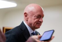 US judge blocks Trump administration from punishing Senator Mark Kelly