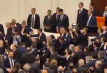 Brawl erupts in Turkish parliament as two parties throw punches over justice minister’s appointment