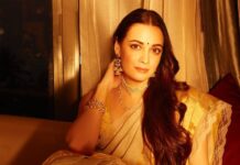 Dia Mirza’s ivory linen sari is detailed with lace and handwoven zari