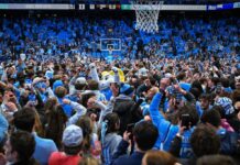 UNC fans prematurely storm court after game-winner just before buzzer vs. rival Duke in wild scene