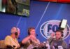 Robert Irwin strolls around Super Bowl Radio Row with massive snake