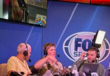 Robert Irwin strolls around Super Bowl Radio Row with massive snake
