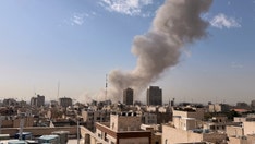 smoke-rises-on-the-skyline-after-an-explosion-in-tehran.jpg