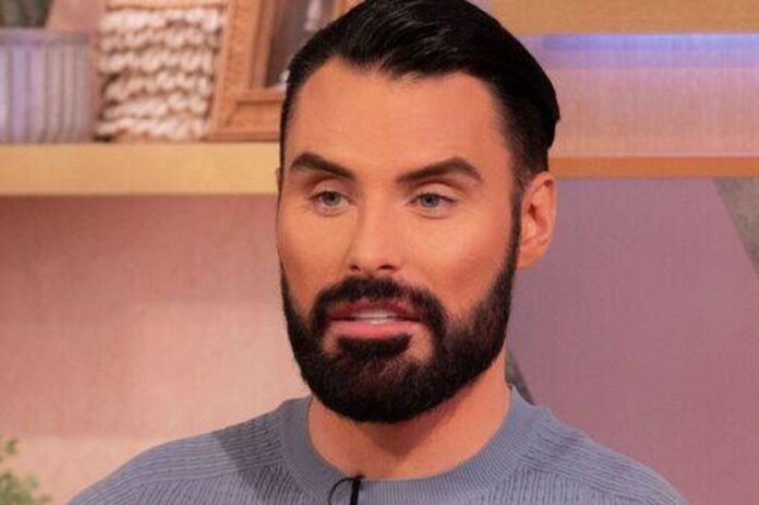 0_Close-up-of-Rylan-Clark-looking-serious-while-speaking.jpg