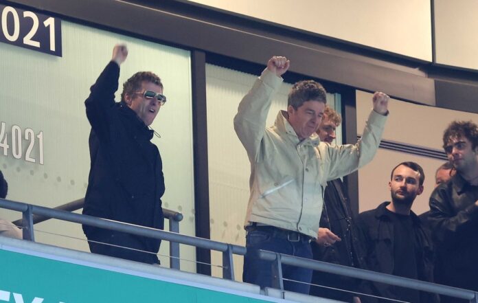 0_PAY-Noel-and-Liam-Gallagher-seen-celebrating-at-Wembley.jpg