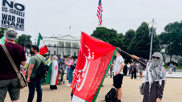 20250622_white-house-protest-with-mahdi-flag.png