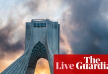 Middle East crisis live: Israel launches ‘wave of strikes’ on Tehran; nearly 150 reported missing after Iranian warship sunk