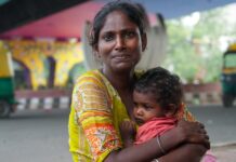 ‘I count their breaths’: A homeless mother protects her children in Delhi