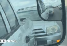 Driver stops out of control SUV with his own vehicle