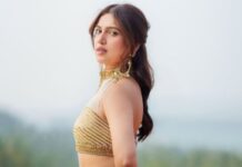 Bhumi Pednekkar pairs crochet-like florals with a metallic halter blouse