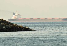 Iran signaling it may deploy mines to disrupt Strait of Hormuz, U.S. sources say