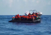 Video shows dozens of migrants being rescued in the Mediterranean Sea