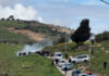 Palestinians flee tear gas as Israeli settlers arrive in occupied West Bank