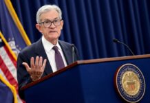 Federal Reserve holds interest rates steady amid Iran war, mixed economic signals