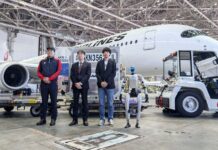 Humanoid robots seen handling airport baggage in futuristic true footage