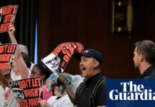 ‘Vought cuts kill people’: Aids activists interrupt Trump budget chief hearing