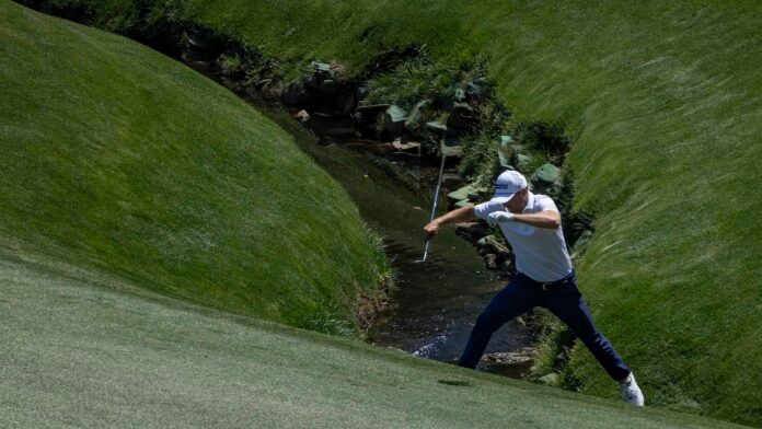Spieth_Masters_jump-2.jpeg