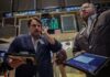 Stocks fall, oil surges after US seizes cargo vessel and Tehran wavers on peace talks