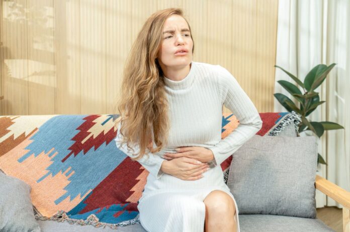 0_Person-experiencing-stomach-pain.jpg
