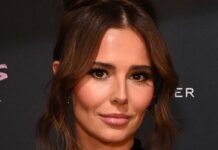 Cheryl shares rare snaps with son Bear, 9, on trip to Disney World in Florida