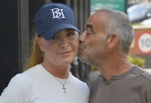 Loved-up Corrie star Michael Le Vell kisses fiancée Louise Gibbons ahead of wedding