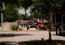 Dallas rescuers search for victims after gas explosion destroys building and ignites blaze