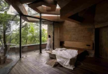 Built Amid a Canopy of Trees, This Sustainable Mud Home Is Made with 4000 Plastic Bottles