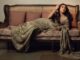 Mrunal Thakur’s mint green sari is finished with dabka and sequin handwork
