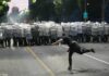 Serbian protesters clash with police amid anti-government rally in Belgrade