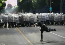 Serbian protesters clash with police amid anti-government rally in Belgrade