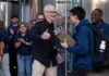 Apple shares pop 4% as shoppers race to buy updated iPhones, MacBooks