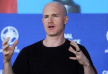 Coinbase to cut 14% of its workforce as part of restructuring plan