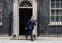 U.K. health secretary resigns in scathing letter, setting up leadership fight