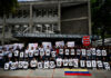 Students block main highway in Caracas to demand release of political priso