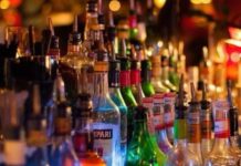 Liquor Van Overturns in Chittoor; Locals Rush to Grab Bottles