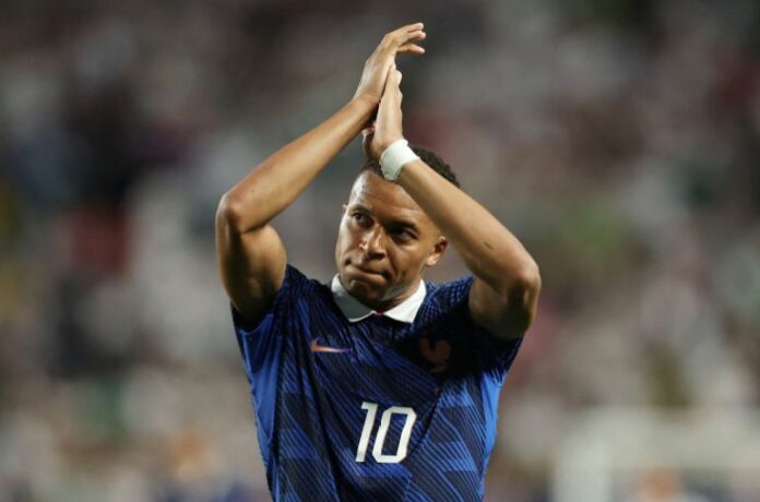 2026-06-23T005620Z_187165768_UP1EM6N02ARBV_RTRMADP_3_SOCCER-WORLDCUP-FRA-IRQ-1782298771.jpg