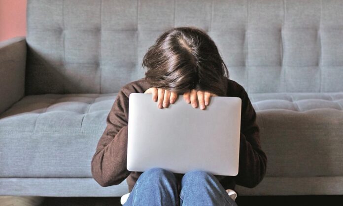 2054747-23full-shot-anxious-woman-holding-laptop.jpg