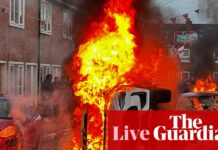 Man to appear in court over Belfast knife attack as rioting described as ‘race-based pogrom’ by SDLP leader – UK politics live