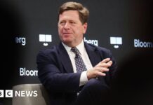 Trump seeks to slow confirming his pick for spy chief and delay hearing