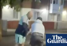 Politicians try to calm tensions inflamed by social media after stabbing in Belfast