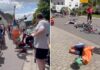 Elderly woman on mobility scooter drives into bike race, causing mass collision as cyclists somersault over handlebars: video