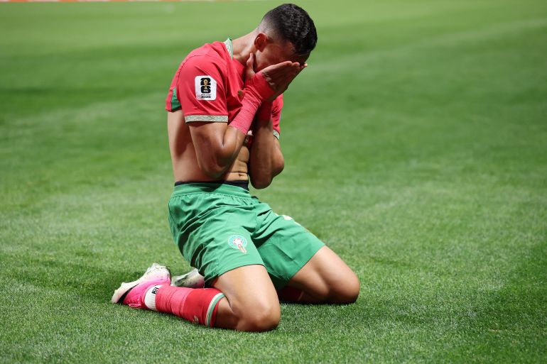 Morocco come back after historic Haiti goals to reach World Cup last 32