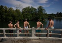France bans some outdoor drinking as heat wave threatens Europe
