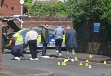 Stabbing attack in Belfast sparks calls for anti-immigration protests