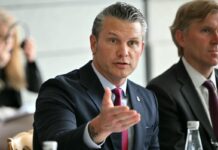 Pete Hegseth warns of boat migrants and ‘dangerous ideologies’ during D-Day speech