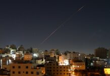 Trump tells Iran and Israel to “stop ‘shooting'” as strikes strain truce