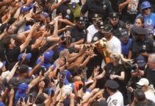 Striking Jalen Brunson image reveals insane love fans have for NBA finals MVP at championship parade